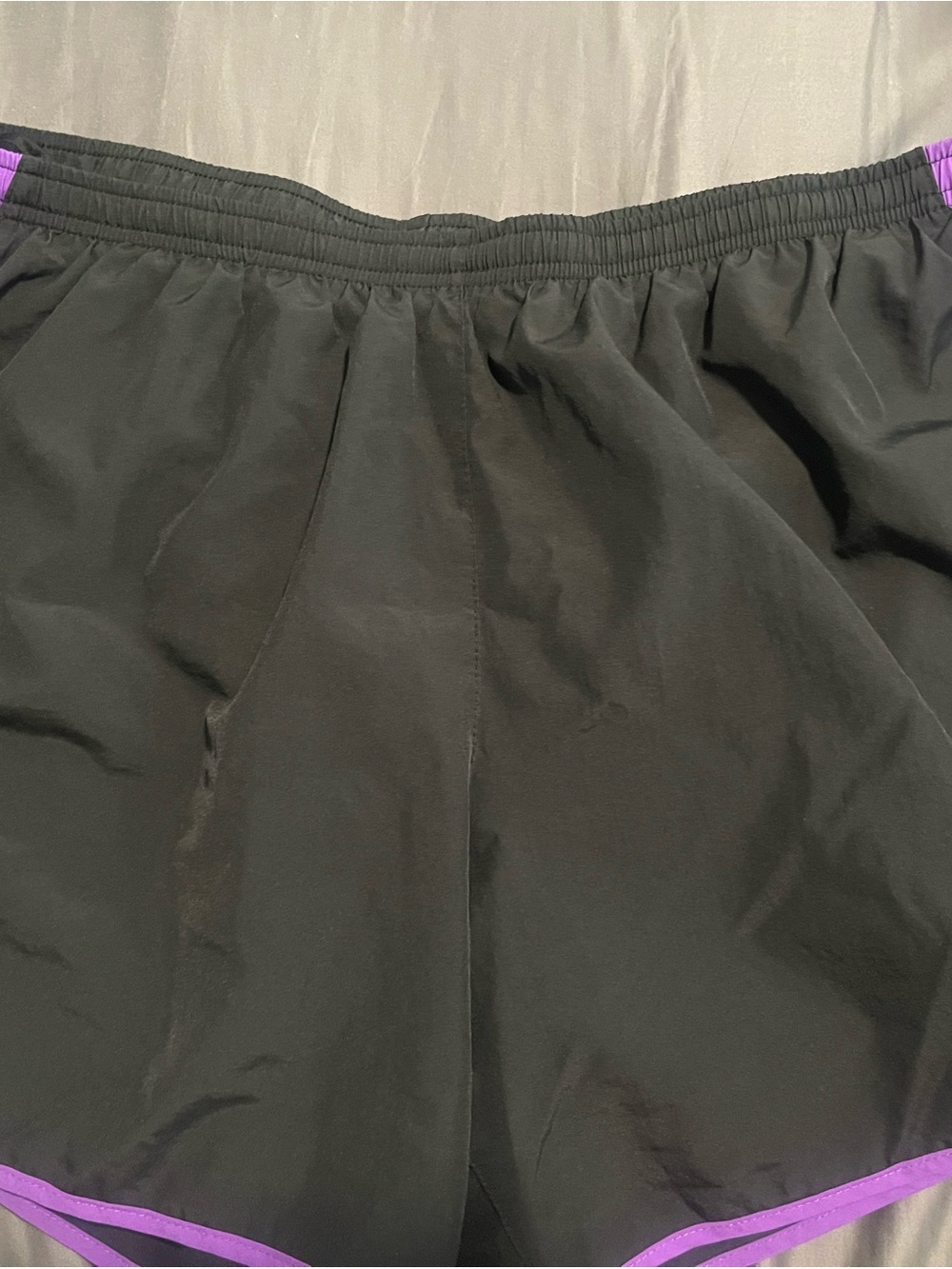 Nike Women's Black Athletic Shorts with Purple Trim